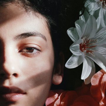 pexels-t-selective-focus-photography-of-woman-lying-on-flowers