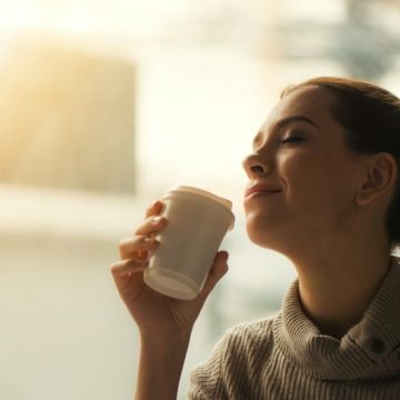 woman-about-to-drink-from-plastic-cup-544117/