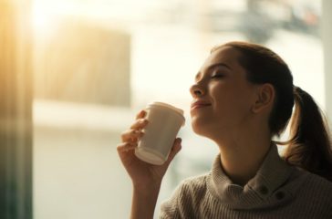 woman-about-to-drink-from-plastic-cup-544117/