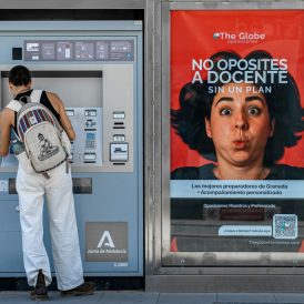 https://unsplash.com/photos/woman-using-ticket-machine-next-to-advertisement-8mVn4zF6BHM