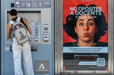 https://unsplash.com/photos/woman-using-ticket-machine-next-to-advertisement-8mVn4zF6BHM