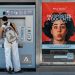 https://unsplash.com/photos/woman-using-ticket-machine-next-to-advertisement-8mVn4zF6BHM