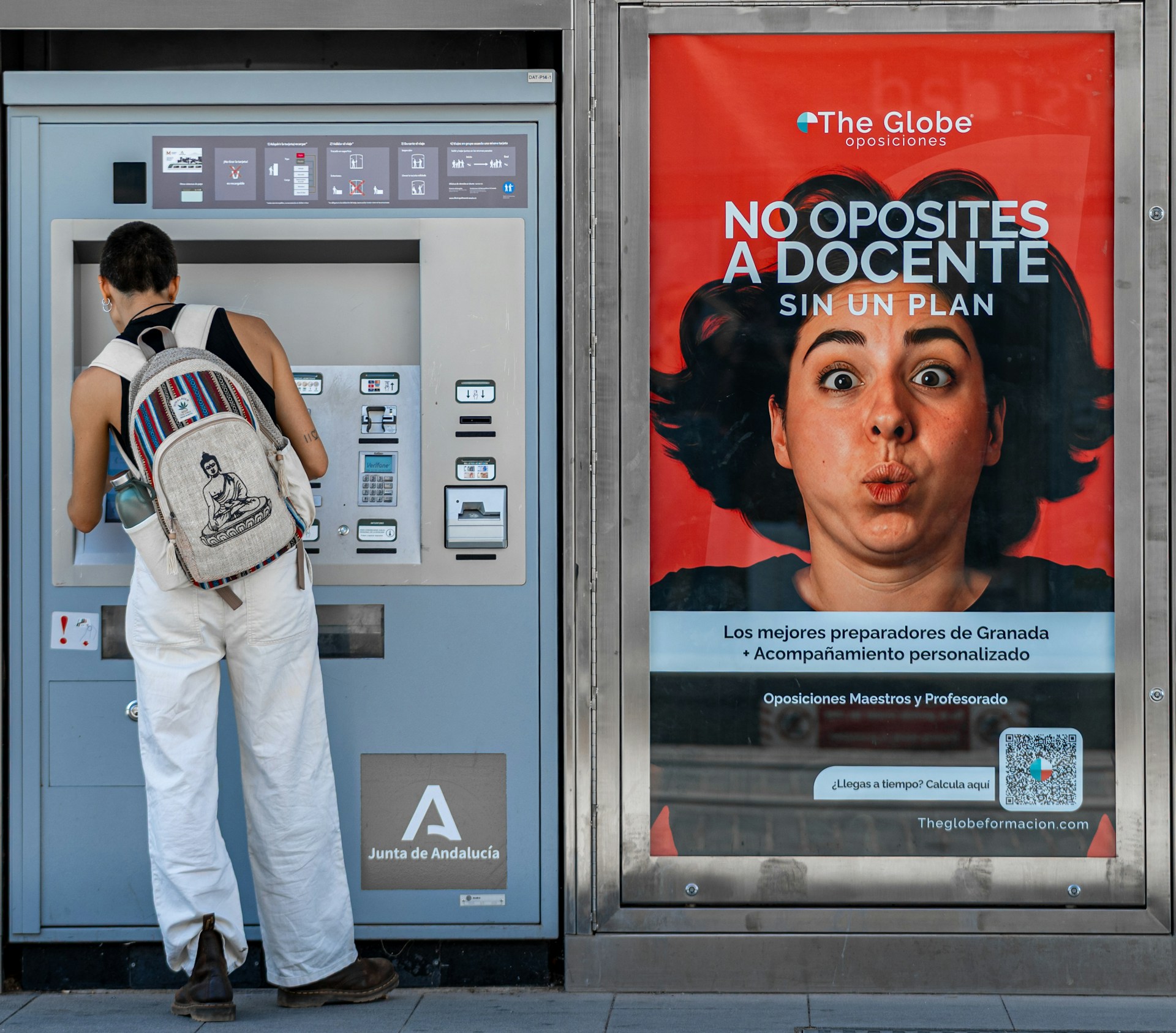 https://unsplash.com/photos/woman-using-ticket-machine-next-to-advertisement-8mVn4zF6BHM