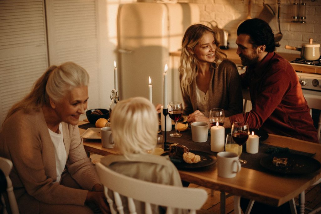 people-sitting-on-chairs-by-the-dining-table-3171207/